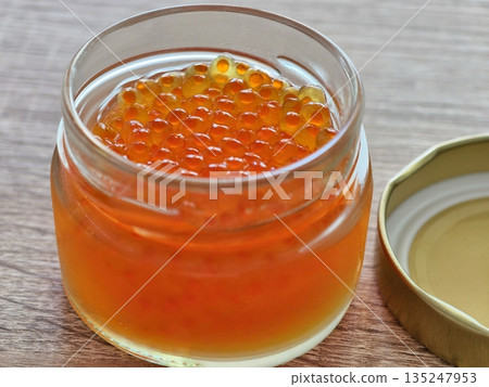 Bright translucent beads accentuate gourmet presentation 135247953