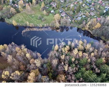colorful forested peninsula from above, aerial view revealing seasonal textures and natural landscapes colorful forested peninsula from above, aerial view revealing seasonal textures and natural landscapes 135248068