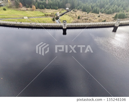 visual representation of heavyduty concrete dam being examined with geometric fencing patterns visual representation of heavyduty concrete dam being examined with geometric fencing patterns 135248106