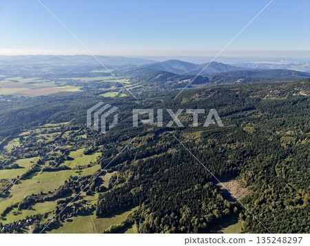 Broad Valley With Fields, Expansive Lowlands Decorated By Contrasting Fields And Natural Features Broad Valley With Fields, Expansive Lowlands Decorated By Contrasting Fields And Natural Features 135248297