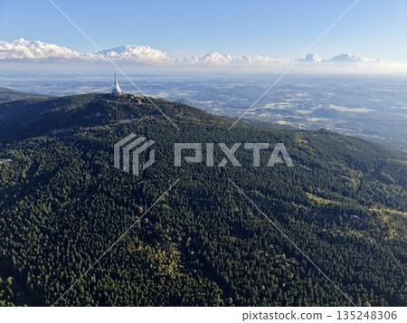 Technological Equipment Situated On Mountain Summit Overlooking Icy Peaks And Vast Visibility Technological Equipment Situated On Mountain Summit Overlooking Icy Peaks And Vast Visibility 135248306