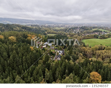 Quiet Rural Community Surrounded By Nature, Hillside Settlement With Colorful Trees And Peaceful Atmosphere Quiet Rural Community Surrounded By Nature, Hillside Settlement With Colorful Trees And Peaceful Atmosphere 135248337