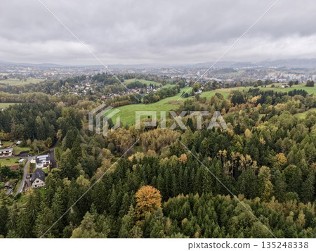 Colored Trees Amidst Quiet Neighborhood, Seasonal Transformation Depicted In Tranquil Leafy Townscape Colored Trees Amidst Quiet Neighborhood, Seasonal Transformation Depicted In Tranquil Leafy Townscape 135248338