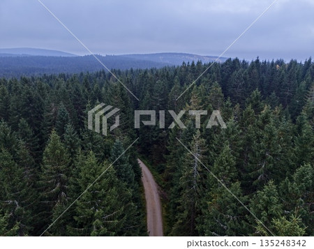 Tranquil Outdoor Landscape At Dusk Time, Calm Twilight Scene Featuring Hills And Towering Trees Tranquil Outdoor Landscape At Dusk Time, Calm Twilight Scene Featuring Hills And Towering Trees 135248342