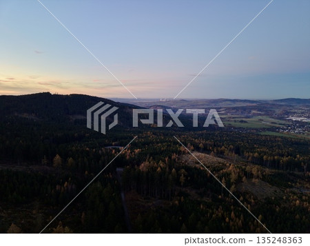 Night Landscape With Luminous Sky, Nighttime Valley Featuring Moonlit Environment And Layered Forests 135248363