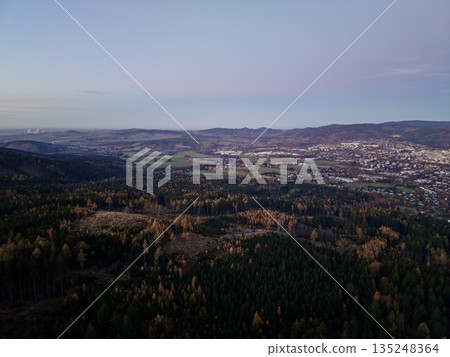 Hillside Panorama With Fall Landscape And Village, Dusk In Valley Dotted With Farms And Distant Town Hillside Panorama With Fall Landscape And Village, Dusk In Valley Dotted With Farms And Distant Town 135248364
