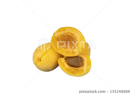 Ripe yellow apricots isolated on white background. 135248989