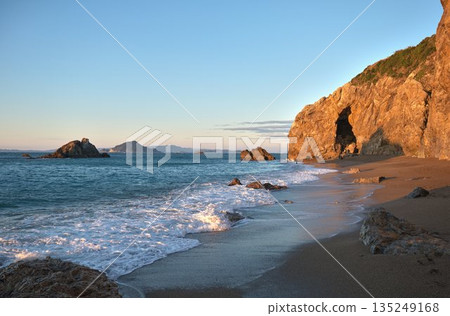 The morning sun shining on the rocky coast of Cape Irago 135249168