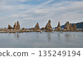 The strange rock formations of Hashiguiiwa in Wakayama and the wide sea at low tide 135249194