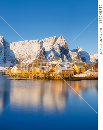 Vertical view of Reine and Hamnoy fishing villages in Lofoten Islands, Norway. Vertical view of Reine and Hamnoy fishing villages in Lofoten Islands, Norway. 135249812