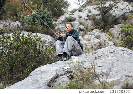 young pretty brunette girl hiking to waterfall, lifestyle people concept young pretty brunette girl hiking to waterfall, lifestyle people concept 135250803