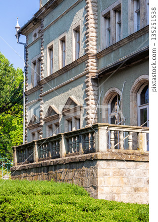 chynadiievo, transcarpathia, ukraine - 28 jul, 2013: schonborn royal palace under blue sky. heritage site in carpathians. popular tourist destination. hunting castle now a sanatorium on sunny day 135251538