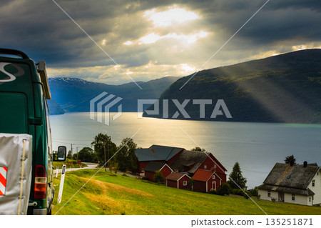 Camper car in norwegian mountains 135251871