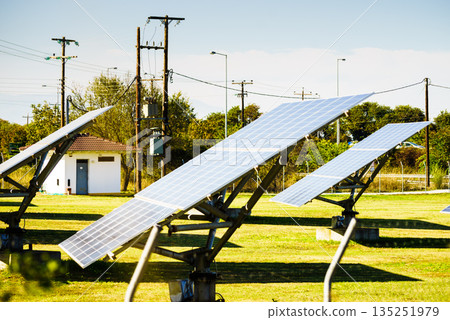Solar panels outdoor during sunny weather. Solar panels outdoor during sunny weather. 135251979