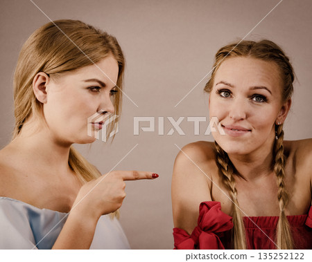 Women accusing each other of something Women accusing each other of something 135252122