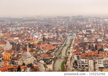 City center with Ottoman era Sinan Pasha mosque, stone architecture, Bistrica riverbank streets and dense urban housing in a historic Balkan town, Prizren, Kosovo City center with Ottoman era Sinan Pasha mosque, stone architecture, Bistrica riverbank streets and dense urban housing in a historic Balkan town, Prizren, Kosovo 135252392