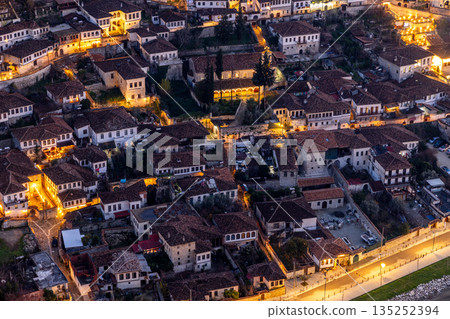 Night view of Gorica old town with highlighted white Ottoman houses, stone architecture and atmospheric historic streets, Berat, Albania 135252394