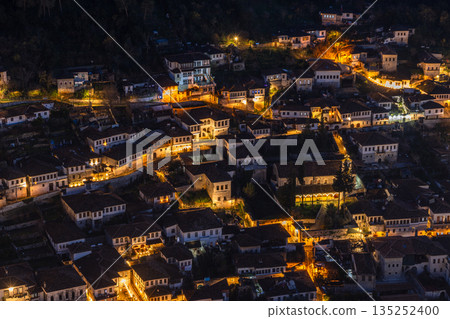 Night view of Gorica old town with highlighted white Ottoman houses, stone architecture and atmospheric historic streets, Berat, Albania 135252400