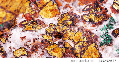 Macro view of raw chalcopyrite ore with metallic golden surface, natural gemstone crystal Macro view of raw chalcopyrite ore with metallic golden surface, natural gemstone crystal 135252617