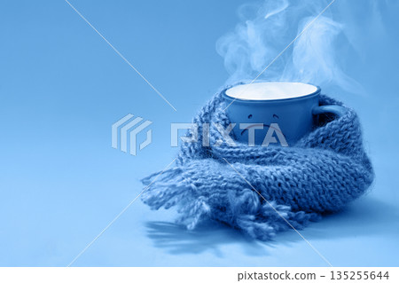 Blue monday, Steaming sad mug feeling cold and flu Blue monday, Steaming sad mug feeling cold and flu 135255644