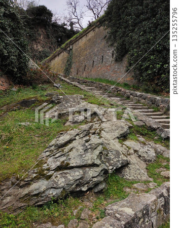 Stone path and stairs inside Petrovaradin Fortress Stone path and stairs inside Petrovaradin Fortress 135255796