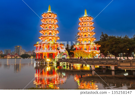 Kaohsiung Lotus Pond's symbol, the Dragon and Tiger Pagoda, at dusk Kaohsiung Lotus Pond's symbol, the Dragon and Tiger Pagoda, at dusk 135258147