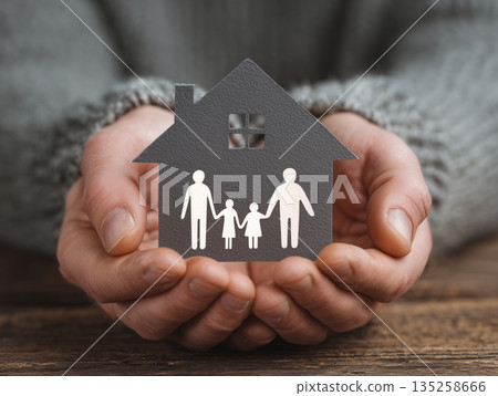 Image of family and home embraced in both hands Image of family and home embraced in both hands 135258666