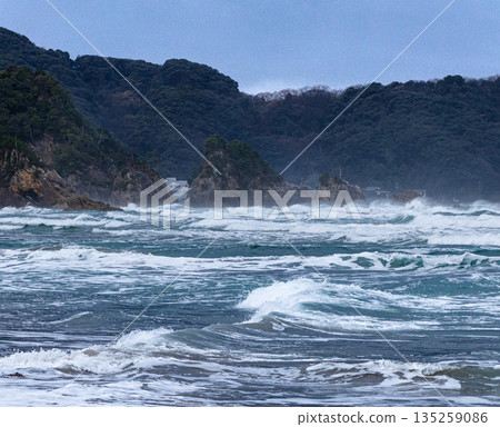 The rough Sea of Japan seen from the coast of Higashihama in Tottori, San'in region, in snowy winter The rough Sea of Japan seen from the coast of Higashihama in Tottori, San'in region, in snowy winter 135259086