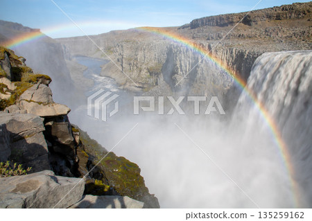 Dettifoss and a rainbow flowing down the Jokulsarlon River in the northern part of the Nordic island nation of Iceland 135259162