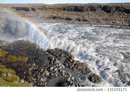 Dettifoss and a rainbow flowing down the Jokulsarlon River in the northern part of the Nordic island nation of Iceland 135259171