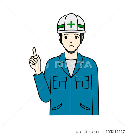 A man wearing work clothes and a helmet and pointing with a troubled expression 135259317