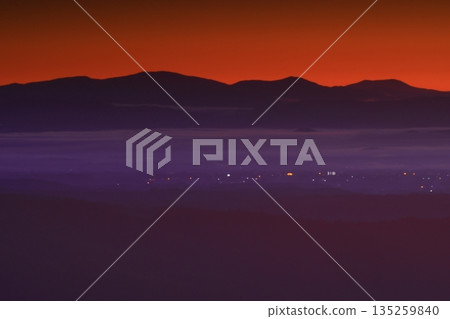 Morning glow stained mountain ranges Morning glow stained mountain ranges 135259840
