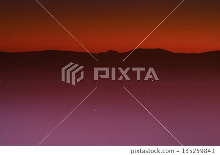 Morning glow stained mountain ranges 135259841