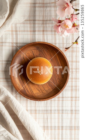 Dorayaki with Red Bean Filling on Wooden Plate 135259865