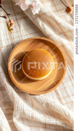 Dorayaki with Red Bean Filling on Wooden Plate Dorayaki with Red Bean Filling on Wooden Plate 135259866