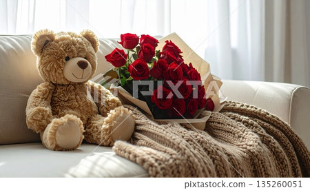 Cozy Minimal Living Room with Knitted Wool Blanket on Sofa, White Window and Sheer Curtains, Decorated with Large Teddy Bear and Rose Bouquet Cozy Minimal Living Room with Knitted Wool Blanket on Sofa, White Window and Sheer Curtains, Decorated with Large Teddy Bear and Rose Bouquet 135260051