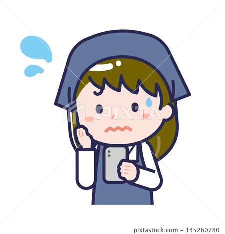 A female "staff member" using a smartphone 135260780