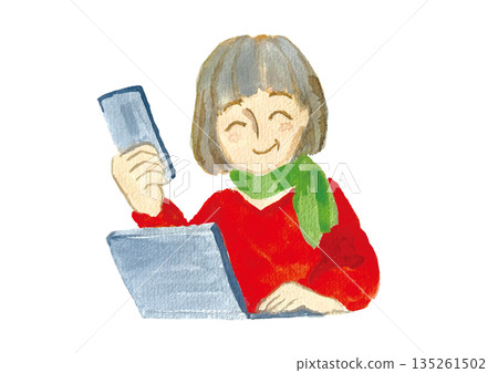 A smiling, stylish senior woman using a smartphone and a computer 135261502