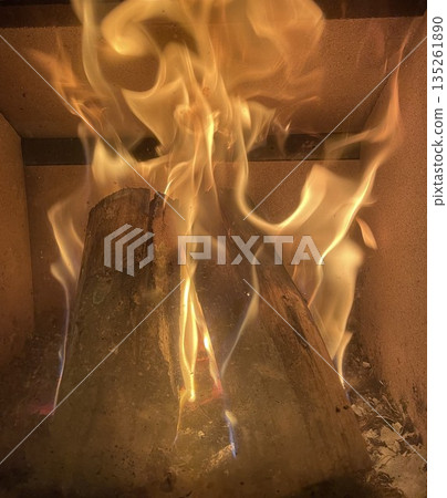 Admirable flames in a fireplace or wood stove Admirable flames in a fireplace or wood stove 135261890