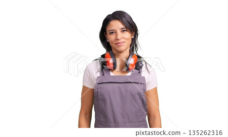 Female construction worker with ear muffs and apron Female construction worker with ear muffs and apron 135262316