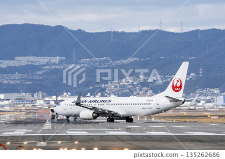 Osaka Airport (Itami Airport) in winter - Airplane taxiing, Toyonaka City, Osaka Prefecture 135262686
