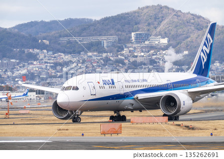 Osaka Airport (Itami Airport) in winter - Airplane taxiing, Toyonaka City, Osaka Prefecture Osaka Airport (Itami Airport) in winter - Airplane taxiing, Toyonaka City, Osaka Prefecture 135262691