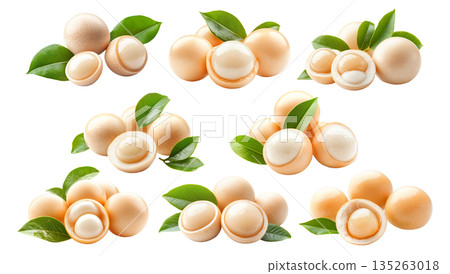 Set of whole and halved longan fruits with green leaves isolated on white transparent background, concept of fresh fruit 135263018