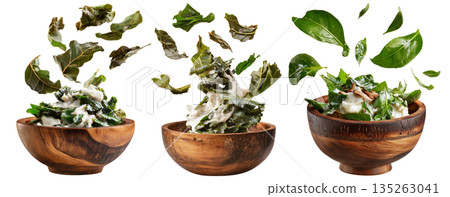 Rourou cooked taro leaves in creamy coconut milk, served in wooden bowl with garnishes, isolated on white background, Fiji cuisine 135263041