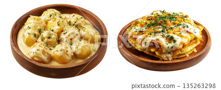 Papa a La Huancana Sliced potatoes in creamy dressing with chili pepper, and garlic in wooden bowl isolated on white background 135263298