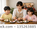 Family gathering at the Doll's Festival dinner table 135263885