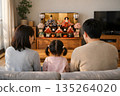 A family quietly watching Hinamatsuri 135264020