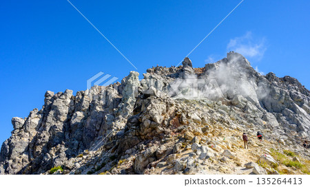 [Northern Alps] Looking up at the northern peak from near the summit of Mt. Yakedake 135264413