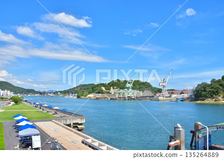 Hiroshima: Mukojima Dock and Onomichi Channel under the blue sky as seen from Onomichi Station Hiroshima: Mukojima Dock and Onomichi Channel under the blue sky as seen from Onomichi Station 135264889