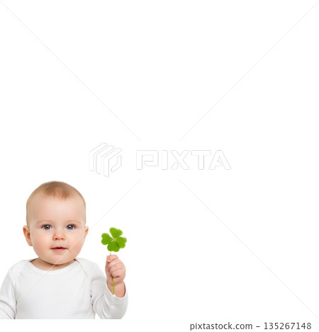 Cute baby holding a four-leaf clover Cute baby holding a four-leaf clover 135267148